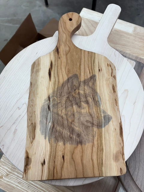 Live edge wolf cutting board