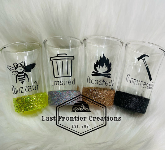 Trashed shot glasses